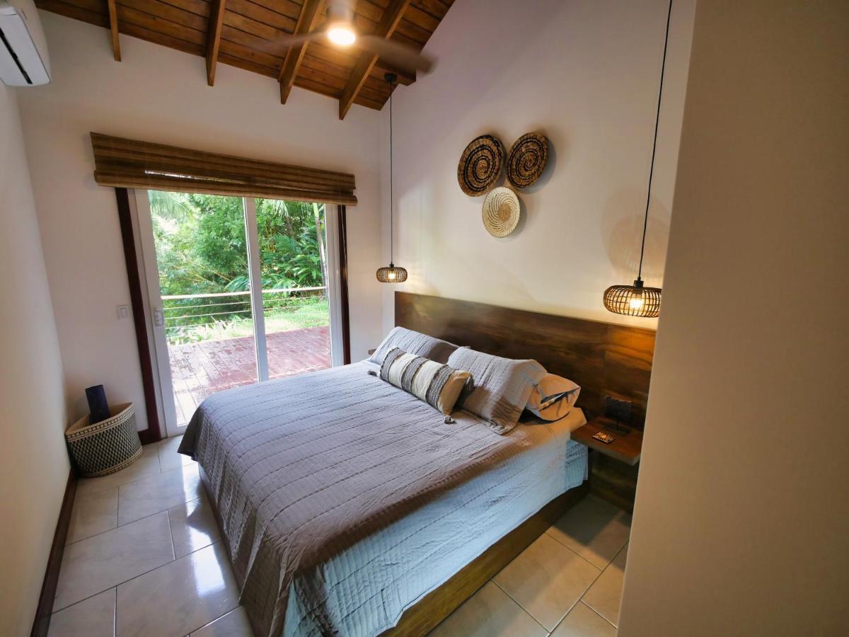 Relax At This Hillside Retreat That Overlooks The Lush Forest And The Caribbean, West End Dış mekan fotoğraf